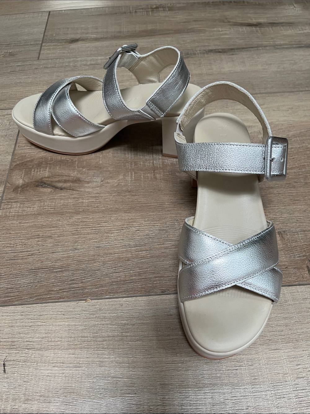 Naot Women's Elite platform sandals in a soft silver leather color. Size 37